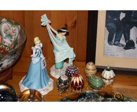 TWO ROYAL DOULTON DISNEY PRINCESSES FIGURES, 'Cinderella' DP1, 'Jasmine' DP6, together with six modern enamel eggs on stands 
