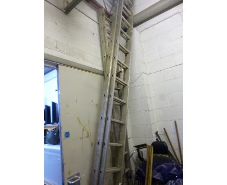 A LARGE ALUMINIUM DOUBLE EXTENDING LADDER, and a similar smaller double extending ladder (2)