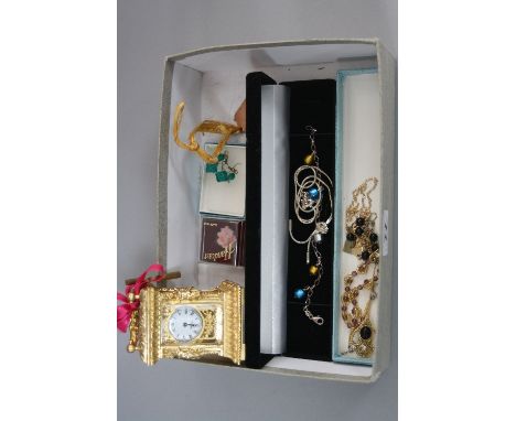A MIXED LOT, to include a small carriage clock, bracelets and costume jewellery, etc