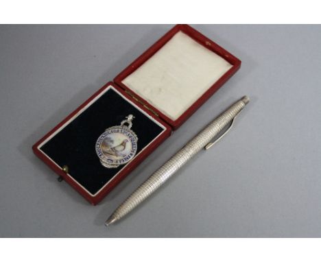 A SILVER AND ENAMEL FOB 'National Union of Short Distance Flyers' and a silver pen (2) 