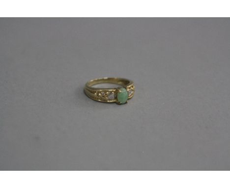 A 9CT DIAMOND AND JADE RING, ring size K