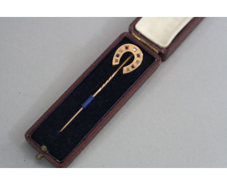 A 9CT VICTORIAN HORSESHOE STICK PIN, set with diamonds (original box)