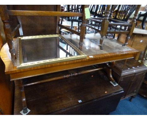 A LARGE MAHOGANY COFFEE TABLE, with leather inset top, table lamp with shade and a gilt framed wall mirror (3)