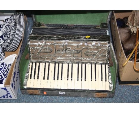 A CASED HOHNER 'VERDI III' PIANO ACCORDION