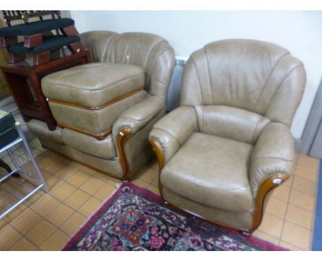 A PALE BROWN LEATHER THREE PIECE SUITE, with wood detail comprising two seater settee, armchair and a pouffe