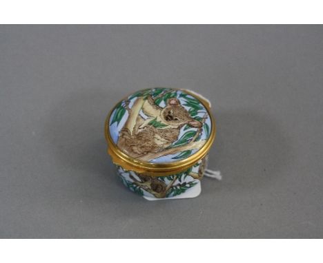 A MOORCROFT ENAMEL PILL BOX, decorated with a Koala Bear