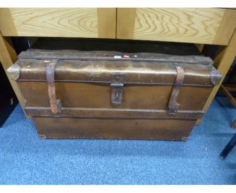 A LARGE TRAVELLING TRUNK, wood and metal bound, approximate size width 94cm x depth 55cm x height 52cm (sd)