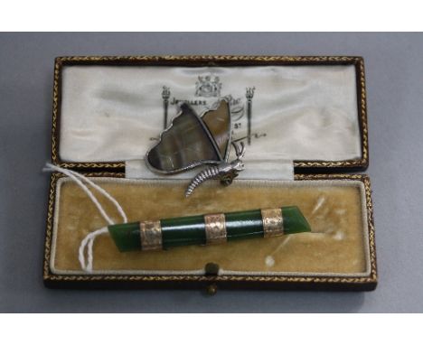 A JADE AND GOLD BAR BROOCH, and a silver Butterfly (2)