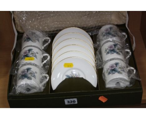 SIX BOXED ROYAL WORCESTER COFFEE CUPS AND SAUCERS