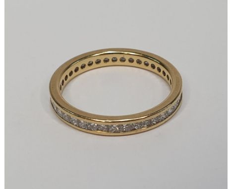 Diamond eternity ring set in unmarked gold,Size N               2.4 grams gross 