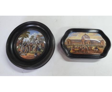 Two antique ceramic pot lids, both in ebonised wood frames (2) 