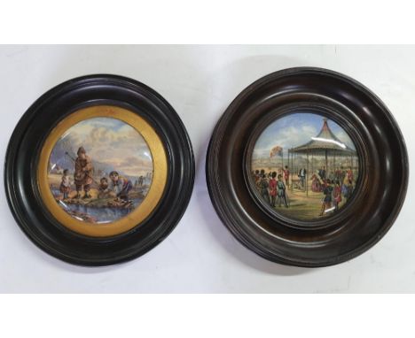 Two antique circular ceramic pot lids, one in ebonised wood frame the other in a fruit wood frame (2) 