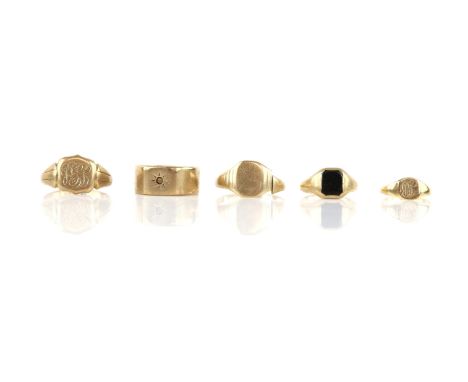 Selection of five gold rings, including two gentleman's signet rings, ring sizes U and W, two ladies' signet rings, one set w