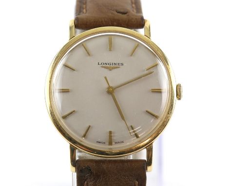 Longines, gold wristwatch, signed silvered dial with gold baton hour markers, signed crown, fitted with a calibre 1945 manual