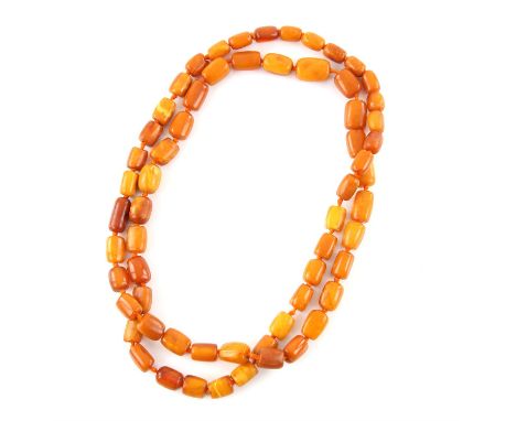 Amber bead necklace, a single strand of graduating barrel shaped amber beads, size ranging from 12.5 to 18.7mm, knot strung, 