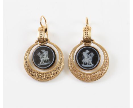 Etruscan style 19th C drop earrings, depicting a Greek figure playing the lyre, carved into hardstone, articulated in an orna