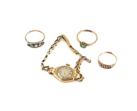 Three rings and a watch, including, five stone paste ring, a knot style keeper ring, both in 9 ct gold, size M, and silver ri