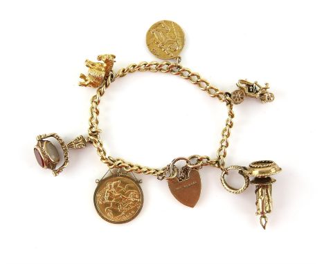 Vintage gold charm bracelet, curb links stamped 18 ct with a later 9 ct heart padlock clasp and safety chain, attached with  