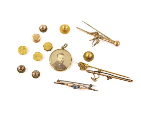 Three brooches, a stick pin, a locket, and dress studs, three brooches all in 9 ct, one depicting a swallow on a rope twist b