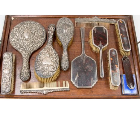 A bag of silver backed dressing table items, non matching, some tortoiseshell, s/d 