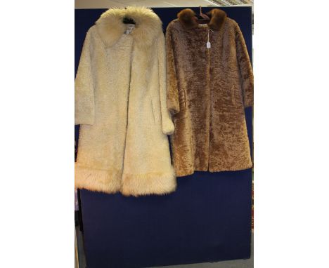 A cream Persian lamb coat, having feature sheepskin collar and hem, with a beige Persian lamb coat, having a matching mink co