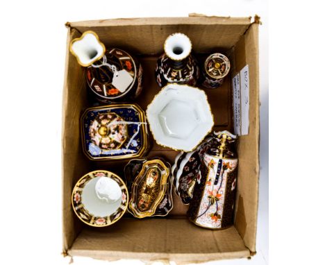 A collection of Royal Crown Derby miniatures to include, bottle vases, tea caddy, milk churn, four footed vase, trinket dishe