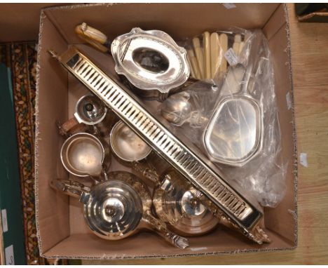 An EPNS part tea service with EPNS Art Deco hot water jug and a bag of Walker and Hall flatware, a silver backed dressing tab