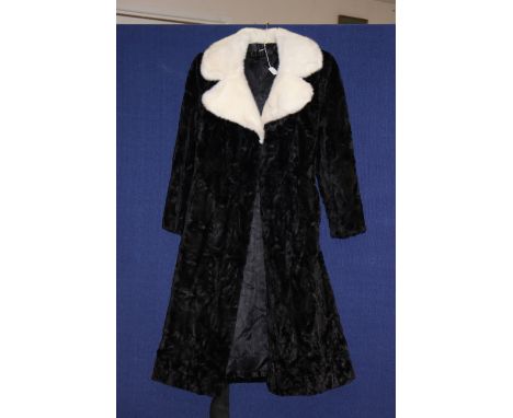 A black Jonathan Tyber simulated fur coat with white simulated fur collar 