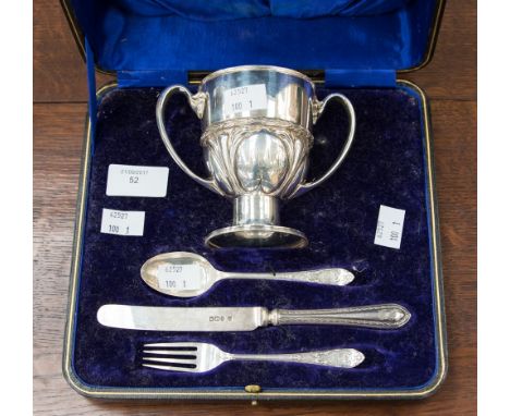 Silver Christening set, comprising drinking cup, spoon, fork and knife (not matching) boxed 