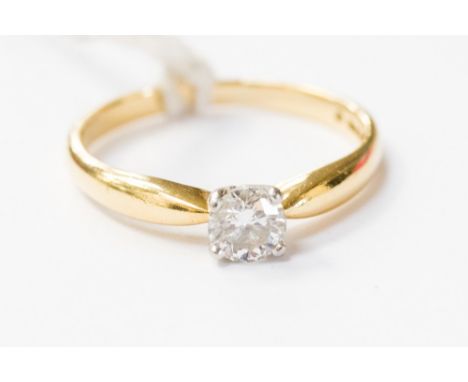 A diamond and 18ct gold ring set with approx 0.50ct diamond, made from Welsh gold with a Dragon motif laser inscribed on the 