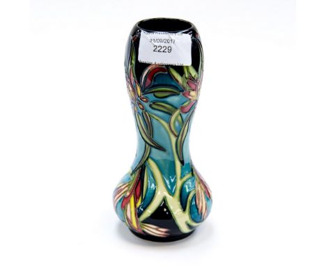 A boxed Moorcroft first quality limited edition vase 44/50 signed by designer to base, dated 2005 Bird of Paradise type flowe