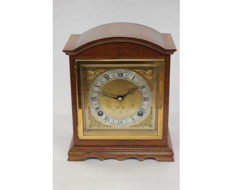 An Elliott mantle clock, for W.H. May Nottingham Roman numerals (key) 