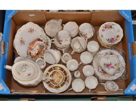 A Royal Crown Derby 'Derby Posies' collection, comprising coffee cups and saucers, side plates, miniature teaset, a 1128 patt