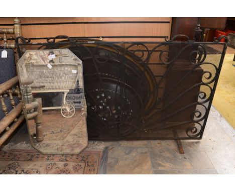 A wrought iron fire screen; together with a vintage mirror and two large aluminium display cases (4) 