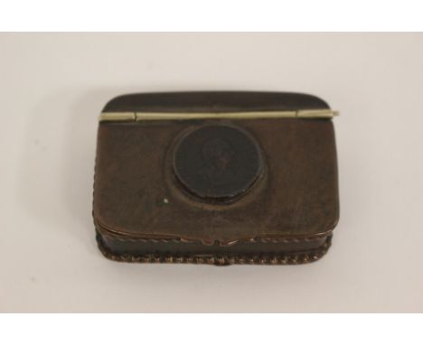 An early 19th Century copper snuff box, inset with a George III 1799 Halfpenny, the box originally Old Sheffield plate 