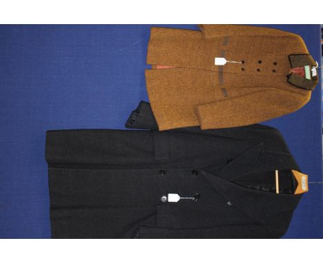 A 1960s child's wool coat in brown and mustard colours in a herringbone pattern, double breasted with brown suede collar and 