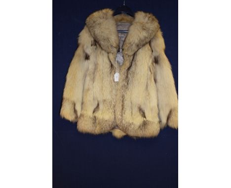 A 1970's Fox fur jacket in a blond/beige colour 