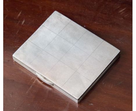 A silver cigarette case with engine turned decoration, Birmingham 1934 maker A Wilcox, retailed by Asprey London, approximate