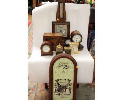 A box of clocks and a wall clock, and a barometer, some keys present (6 mantle clocks, one wall clock and one barometer in on