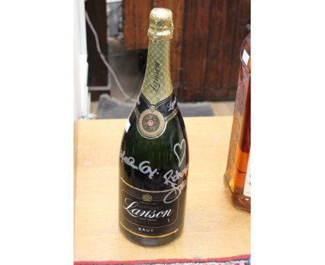A 1 1/2L bottle of Lanson Champagne signed by Norwegian pop group 'A HA' 