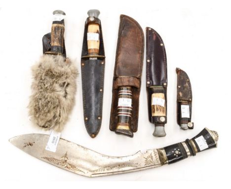 A collection of general purpose hunting knives and one Supreme throwing knife with 9cm blade. All in brown leather scabbards,