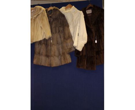A 1930s cream shaved rabbit fur jacket with cravat style tie detail to collar, tapered cuff and bobble decoration, small tear