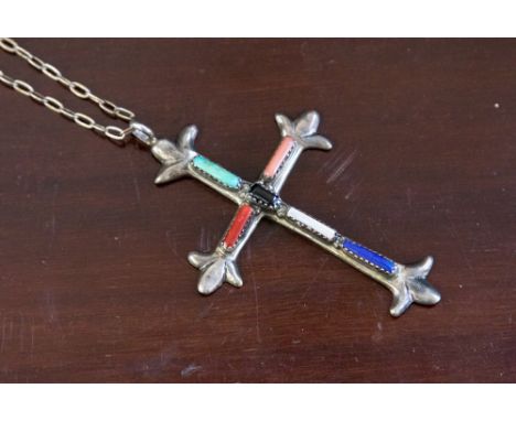 A silver cross set with baguette cut/polished stones, marked G&L Leekity on a 925 silver chain marked MEX,  7 cm long by 5 cm