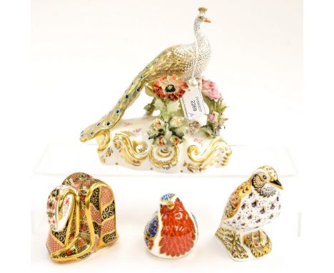 A Royal Crown Derby Peacock, seconds, with a Song Thrush paperweight, gold stopper, first quality, a Robin paperweight, gold 