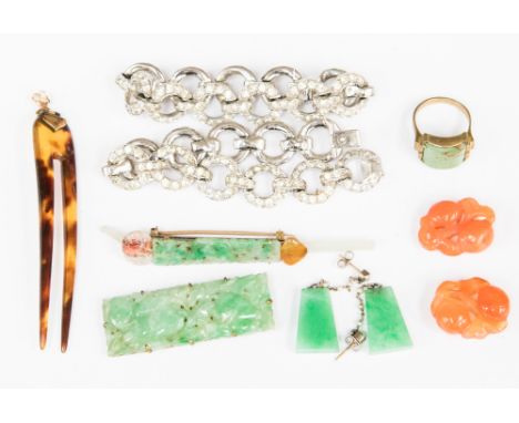 A carved jade gemstone set yellow metal brooch, a carved jade yellow metal dress clip, a pair of jade and seed pearl drop ear