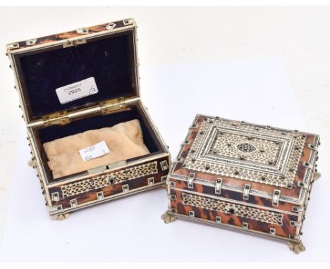 A Tortoiseshell velvet lined trinket box, having carved bone decoration, with a Tortoiseshell cedar lined cigarette box also 