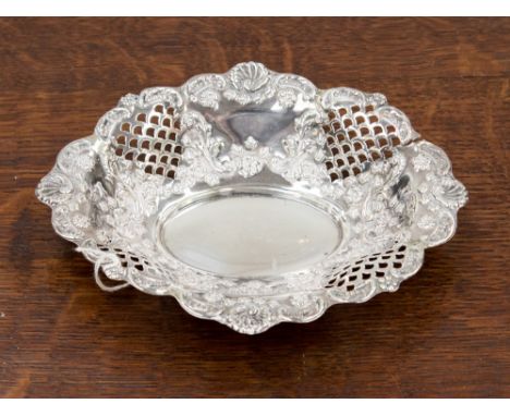 An oval silver pierced and embossed trinket dish, weighing approx 2.68 ozt, Chester 1896 Ellis and Co
