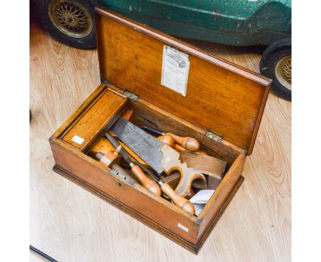 A Victorian oak tool chest containing twenty two tools (1) 