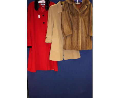 A camel coat with toggle loops in the style of a duffel coat (wool and cashmere) a red wool 1970s coat by Lampet of London wi