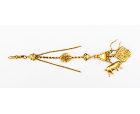 A Victorian 9ct gold  Albertina fob chain, with a central detail set with rubies back and front, along with a tassel and thre
